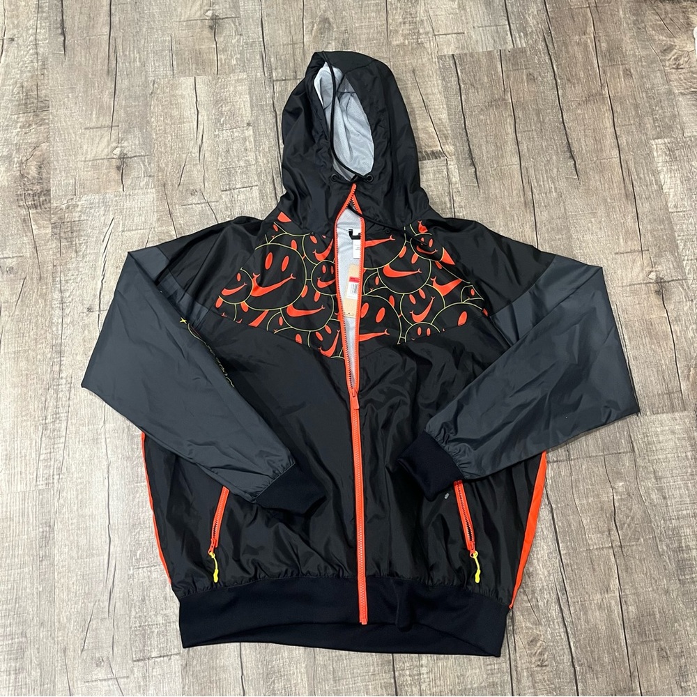 Nike “Go the extra smile” windbreaker jacket